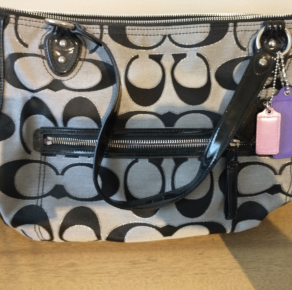Gently Used AUTHENTIC Coach Shoulder Bag with a GORGEOUS purple lining!